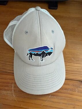 Tan Mesh-Back Patagonia Trucker Hat with Buffalo Patch